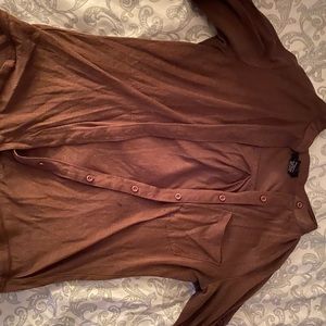 Woman’s button up brown top